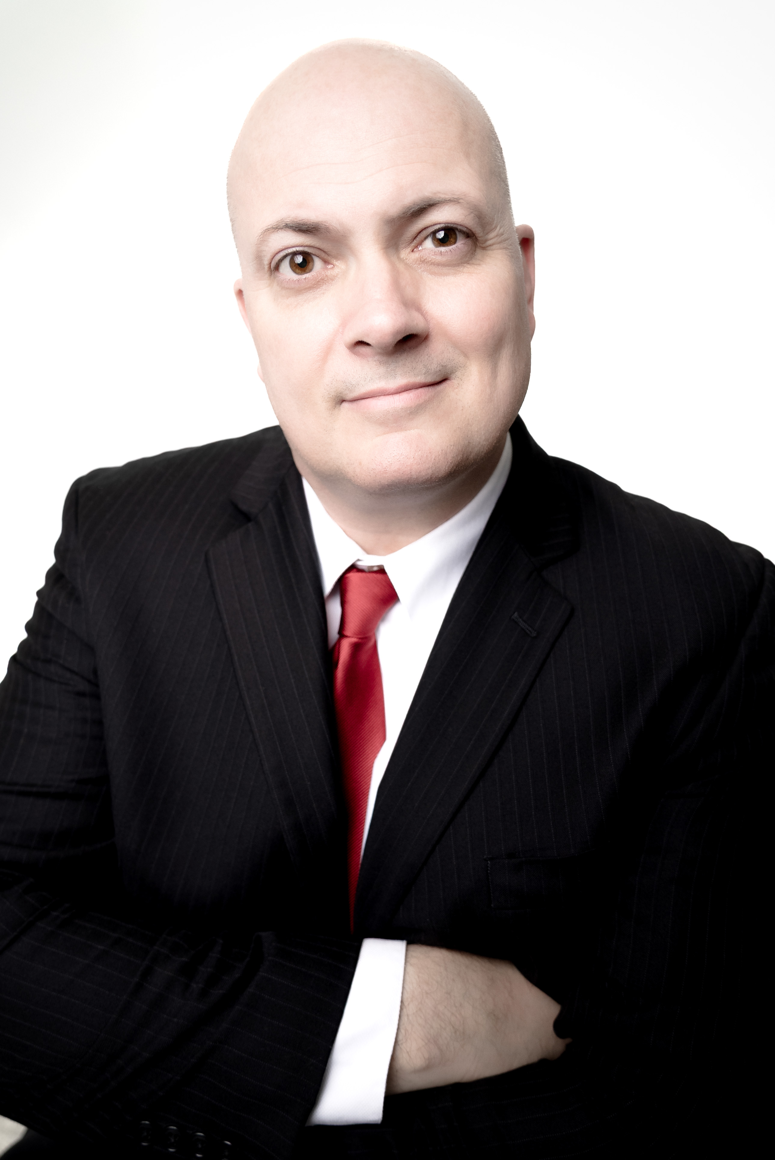 Prof. Robert Perrons with arms crossed